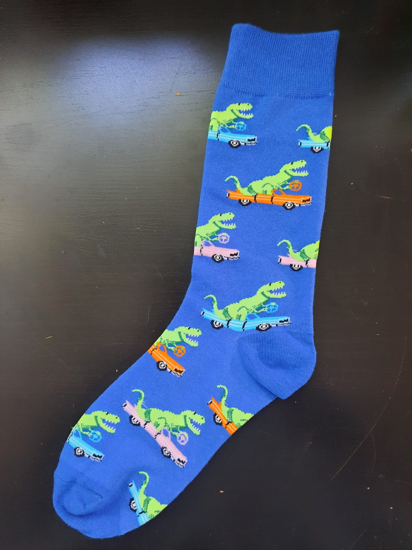 Dinosaurs driving cars socks